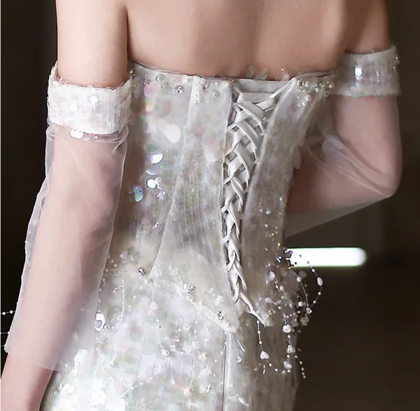 Sexy Bling Bling Ivoire Perlage Perle Paillettes Robe De Soirée 2026 Trompette / Sirène De l'épaule Sans Manches Dos Nu Train De Balayage Soirée Robe De Ceremonie