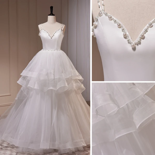 Mode Blanche Volants en Cascade Robe De Mariée 2023 Robe Boule Bretelles Spaghetti Perle Sans Manches Dos Nu Train De Balayage Mariage