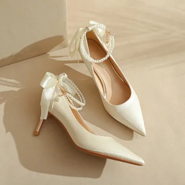 Eleganckie Kość Słoniowa Perła Kokarda Z Paskiem Buty Ślubne 2023 Satyna 8 Cm Szpilki Szpiczaste Ślub Czółenka Wysokie Obcasy