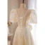 Élégant Champagne En Dentelle Fleur Robe De Bal 2022 Princesse Perle Encolure Carrée Gonflée Manches Courtes Dos Nu Noeud Longue Robe De Ceremonie