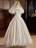 Vintage / Retro Ivory Satin Lace Wedding Dresses 2024 Ball Gown Scoop Neck Bow Puffy Short Sleeve Backless Floor-Length / Long Wedding