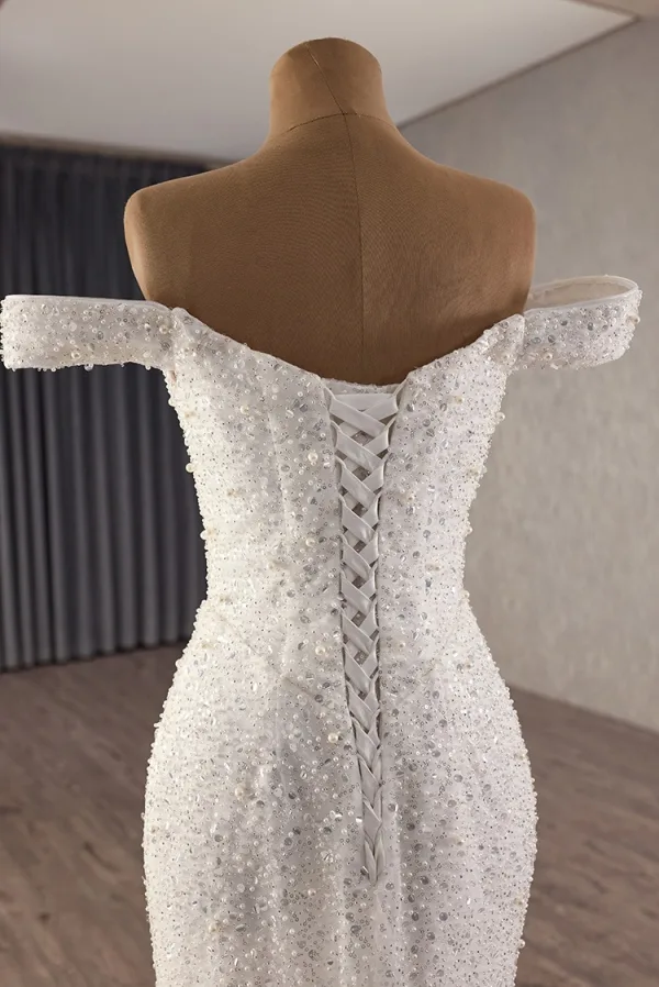 Luxe Blanche Fait main Perlage Perle Paillettes Robe De Mariée 2025 Trompette / Sirène De l'épaule Sans Manches Dos Nu Chapel Train Mariage