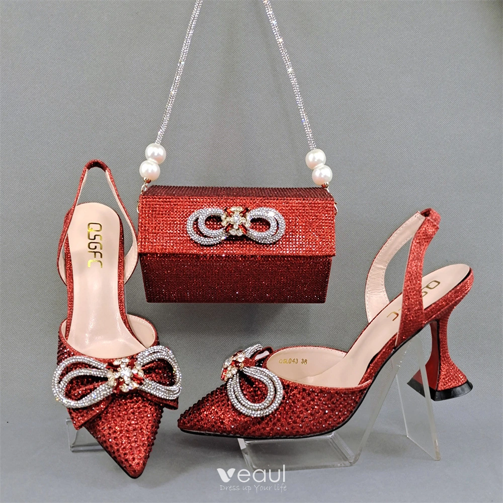 Red heels and clutch bag clearance