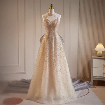 Sexy Champagne Beading Pearl Sequins Evening Dresses 2023 A Line Princess Halter Sleeveless Backless Bow Sweep Train Evening Party Formal Dresses