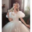 Illusion White Prom Dresses 2022 A-Line / Princess Square Neckline Bow Puffy Short Sleeve Backless Floor-Length / Long Prom Formal Dresses