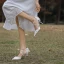 Elegant White Satin Pearl Appliques Wedding Shoes 2024 X-Strap 8 cm Stiletto Heels Pointed Toe Wedding Sandals High Heels
