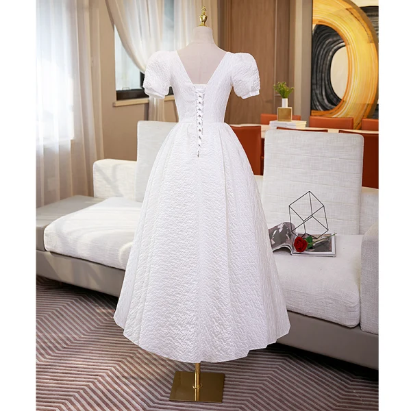 Simple Ivoire Couleur Unie Robe De Bal 2022 Princesse Encolure Carrée Manches Courtes Dos Nu Ceinture Noeud Longue Robe De Ceremonie