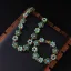 Vintage Lindgrün Strass Legierung Blumen Ball Ohrringe Halsketten Armbänder 2025