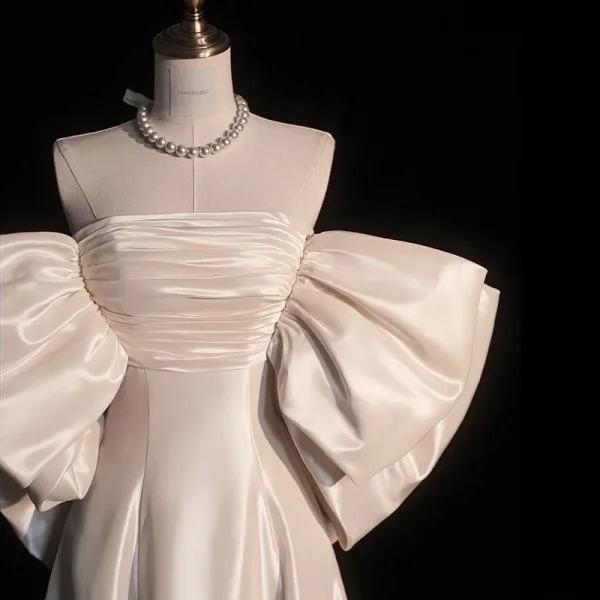 Élégant Ivoire Satin Robe De Bal 2025 Princesse De l'épaule Gonflée Manches Courtes Dos Nu Noeud Train De Balayage Promo Robe De Ceremonie