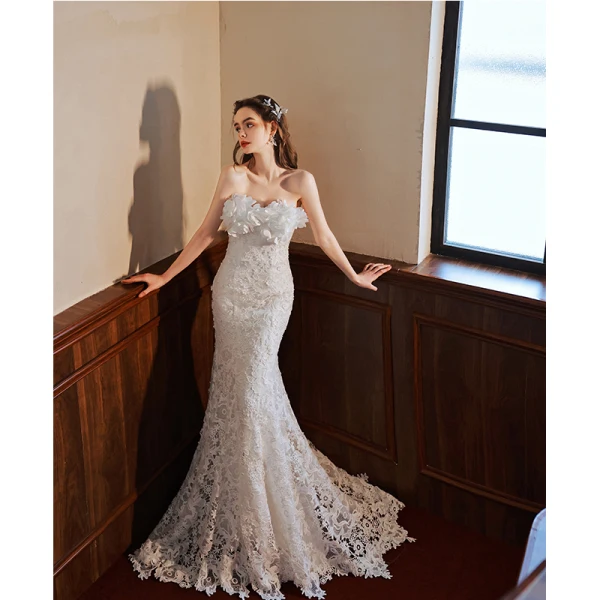 Charmant Ivoire Appliques En Dentelle Fleur Robe De Mariée 2022 Trompette / Sirène Bustier Sans Manches Dos Nu Longue Mariage