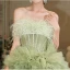 Charming Sage Green Cascading Ruffles Evening Dresses 2023 Ball Gown Strapless Tassel Sleeveless Backless Sweep Train Evening Party Formal Dresses