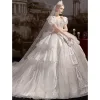 Luxury / Gorgeous Ivory Cascading Ruffles Wedding Dresses 2022 Ball Gown Scoop Neck Puffy Short Sleeve Beading Pearl Rhinestone Sequins Backless Bow Royal Train Wedding