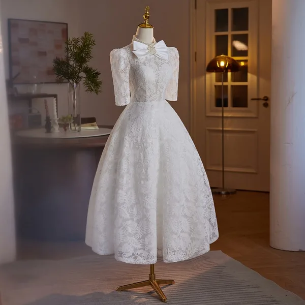 Élégant Blanche De Fiançailles En Dentelle Fleur Robe De Mariée 2024 Robe Boule Col Haut Perle Noeud 1/2 Manches Dos Nu Thé Longueur Mariage