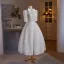 Élégant Blanche De Fiançailles En Dentelle Fleur Robe De Mariée 2024 Robe Boule Col Haut Perle Noeud 1/2 Manches Dos Nu Thé Longueur Mariage