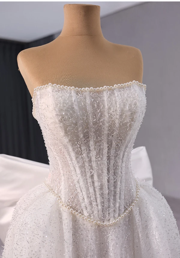 Luxe Blanche Fait main Perlage Perle Paillettes Robe De Mariée 2024 Trompette / Sirène Bustier Sans Manches Dos Nu Noeud Train De Balayage Mariage