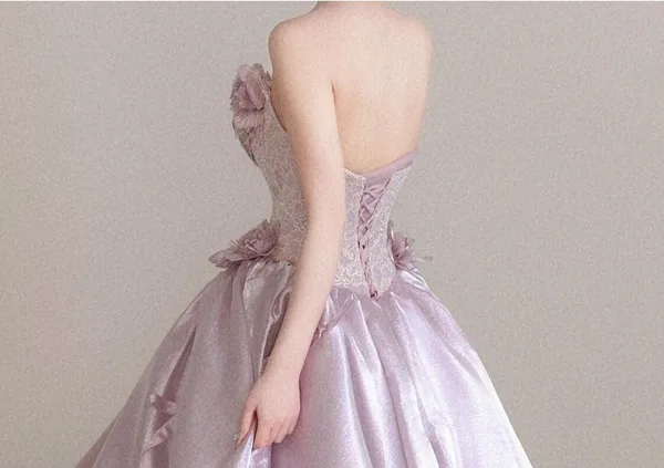 Lovely Blushing Pink Lace Flower Appliques Prom Dresses 2026 Ball Gown Strapless Sleeveless Backless Sweep Train Formal Dresses