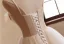 Schöne Champagner Perlenstickerei Perle Spitze Blumen Ballkleider 2024 Ballkleid Spaghettiträger Ärmellos Rückenfreies Schleife Stoffgürtel Sweep / Pinsel Zug