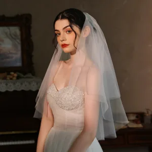 Proste Simple Eleganckie Białe Tiulowe Welony Ślubne 2025