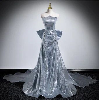 Scintillantes Sexy Argenté Paillettes Robe De Soirée 2024 Trompette Sirène Bustier Sans Manches Dos Nu Noeud Tribunal Train Soirée Robe De Ceremonie