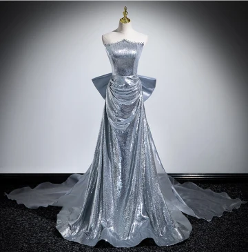 Scintillantes Sexy Argenté Paillettes Robe De Soirée 2024 Trompette Sirène Bustier Sans Manches Dos Nu Noeud Tribunal Train Soirée Robe De Ceremonie
