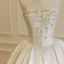 Luxe Ivoire Fait main Faux Diamant Satin Robe De Mariée 2026 Robe Boule Bustier Sans Manches Dos Nu Longue