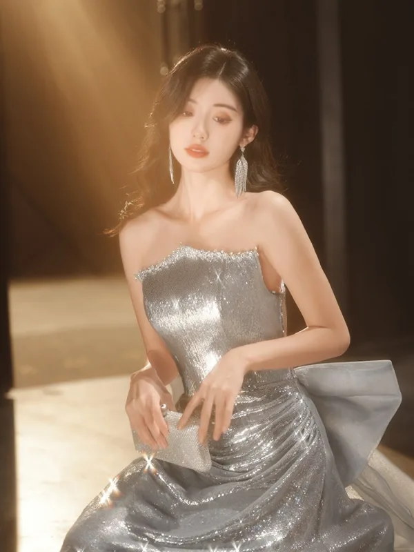 Scintillantes Sexy Argenté Paillettes Robe De Soirée 2026 Trompette / Sirène Bustier Sans Manches Dos Nu Noeud Train De Balayage Soirée Robe De Ceremonie