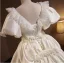 Vintage / Retro Ivory Satin Appliques Wedding Dresses 2025 Ball Gown V-Neck Puffy Short Sleeve Backless Court Train