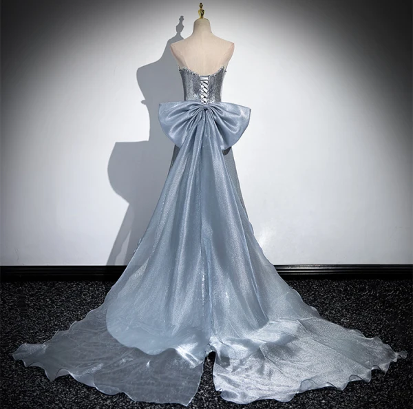 Scintillantes Sexy Argenté Paillettes Robe De Soirée 2024 Trompette / Sirène Bustier Sans Manches Dos Nu Noeud Tribunal Train Soirée Robe De Ceremonie