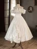 Vintage / Retro Ivory Satin Wedding Dresses 2024 A-Line / Princess Ruffle Spaghetti Straps Short Sleeve Backless Floor-Length / Long Wedding