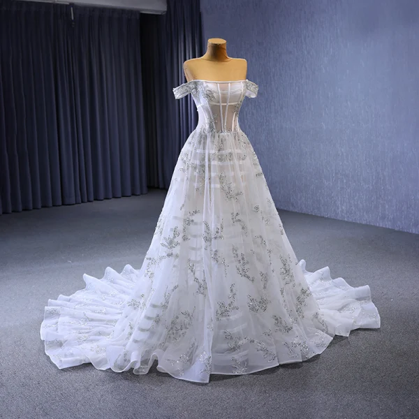 Haut de Gamme Blanche Fait main Perlage Paillettes Robe De Mariée 2023 Princesse De l'épaule Sans Manches Dos Nu Tribunal Train Mariage