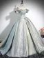 Charming Gold Silver Prom Dresses 2024 Ball Gown Ruffle Off-The-Shoulder Short Sleeve Backless Sweep Train Prom Formal Dresses