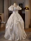 Vintage / Retro Ivory Appliques Satin Wedding Dresses 2024 Ball Gown V-Neck Puffy Short Sleeve Backless Floor-Length / Long Wedding