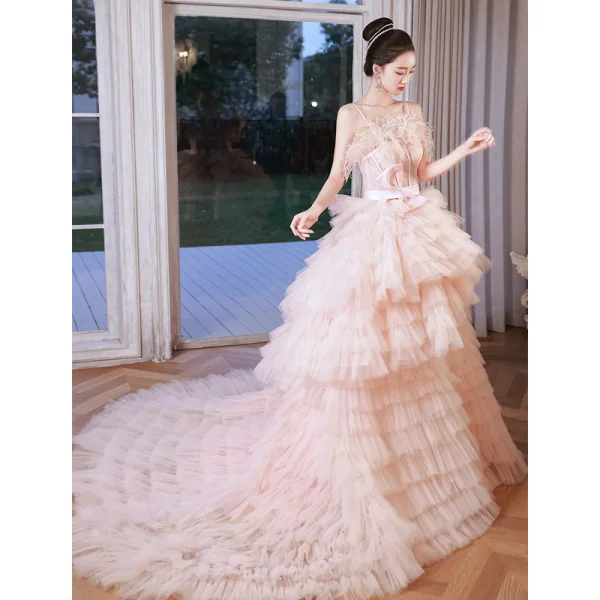 Charmant Rosa Fallende Rüsche Brautkleider / Hochzeitskleider 2023 Ballkleid Spaghettiträger Quaste Ärmellos Rückenfreies Schleife Stoffgürtel Kapelle-Schleppe Hochzeit