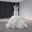 Sexy Haut de Gamme Blanche Perle Faux Diamant Volants en Cascade Robe De Mariée 2024 Trompette / Sirène Bustier Sans Manches Dos Nu Train De Balayage Mariage