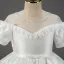 Élégant Ivoire Satin Mariage Robe Ceremonie Fille 2022 Robe Boule Encolure Dégagée Manches Courtes En Dentelle Fleur Ceinture Noeud Longue Robe Ceremonie Fille