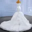 Haut de Gamme Blanche Volants Robe De Mariée 2022 Trompette / Sirène Bretelles Spaghetti Sans Manches Dos Nu Chapel Train Mariage