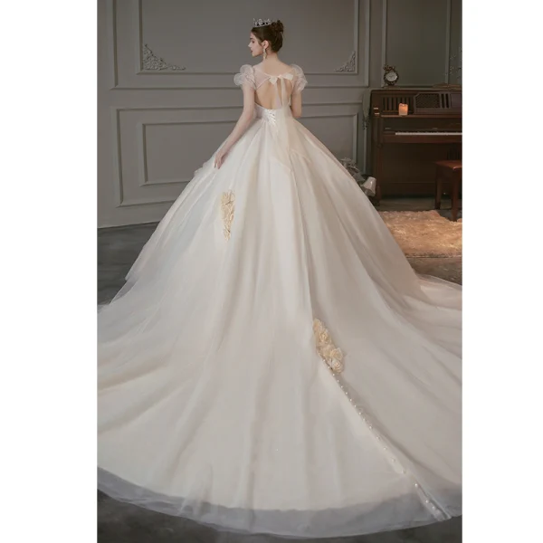 Audrey Hepburn Style Champagne Pearl Lace Flower Appliques Wedding Dresses 2022 Ball Gown Square Neckline Short Sleeve Backless Royal Train Wedding