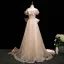 Charmant Champagne Perlage Paillettes Robe De Bal 2025 Princesse De l'épaule Manches Courtes Dos Nu Noeud Train De Balayage Tulle Robe De Ceremonie