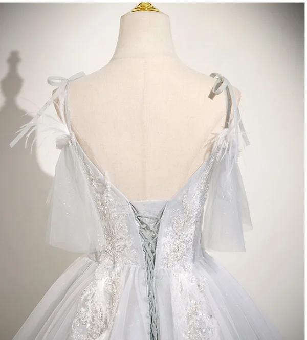 Charmant Blanche Perlage Paillettes Robe De Bal 2025 Robe Boule Bretelles Spaghetti Sans Manches Dos Nu Longue Robe De Ceremonie