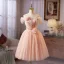 Chic / Beautiful Blushing Pink Pearl Appliques Short Homecoming Graduation Dresses 2026 Ball Gown Off-The-Shoulder Short Sleeve Backless Formal Dresses