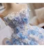 Charmant Haut de Gamme Blanche Fait main Perle En Dentelle Fleur Appliques Robe De Bal 2025 Robe Boule Bustier Sans Manches Dos Nu Train De Balayage