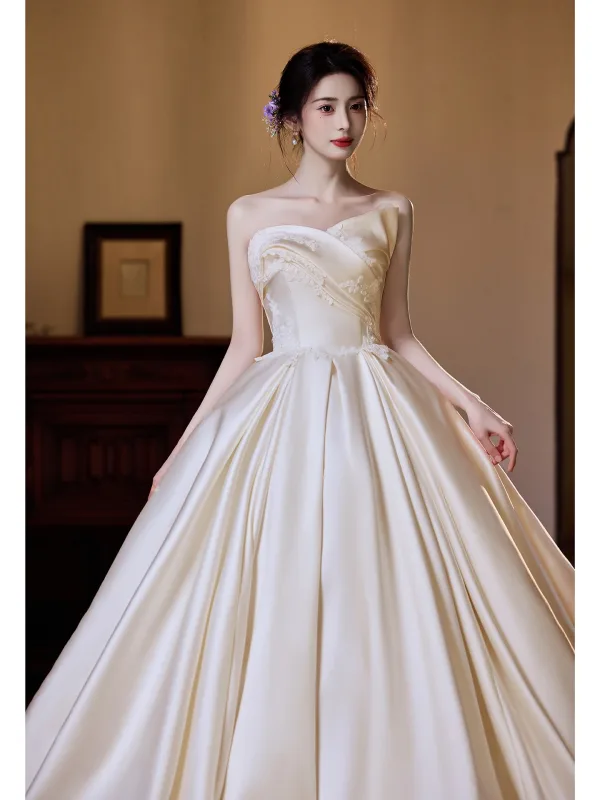 Vintage Ivoor Satijn Trouwjurken 2025 Baljurk Strapless Mouwloos Ruglooze Sweep Trein