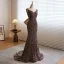 Sexy Scintillantes Doré Paillettes Robe De Soirée 2023 Trompette / Sirène Bretelles Spaghetti Sans Manches Dos Nu Noeud Train De Balayage Soirée Robe De Ceremonie
