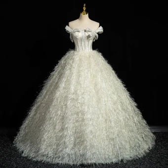Charmant Ivoire Glitter Paillettes Gland Robe De Bal 2023 Robe Boule Bustier Noeud Sans Manches Dos Nu Longue Robe De Ceremonie