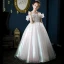 Charmant Blanche Laser Anniversaire Robe Ceremonie Fille 2022 Robe Boule De l'épaule Sans Manches Dos Nu Perle Perlage En Dentelle Fleur Longue Robe Ceremonie Fille