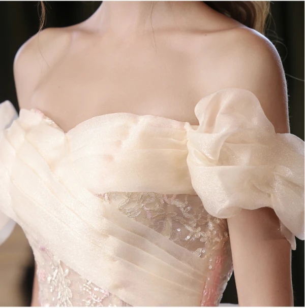 Charming Champagne Sequins Lace Flower Prom Dresses 2024 Trumpet / Mermaid Off-The-Shoulder Sleeveless Backless Bow Sweep Train Prom Formal Dresses