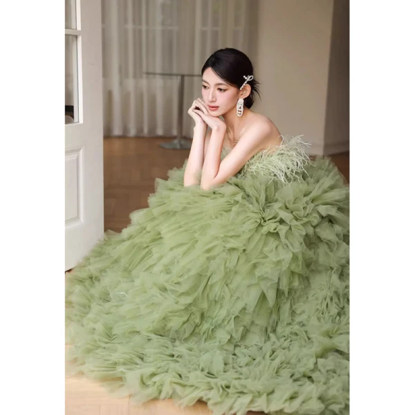 Charming Sage Green Cascading Ruffles Evening Dresses 2023 Ball Gown Strapless Tassel Sleeveless Backless Sweep Train Evening Party Formal Dresses