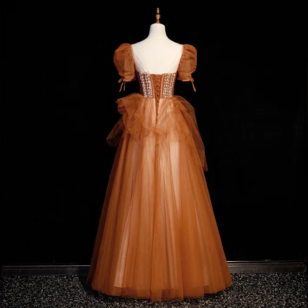 Élégant Tan Perlage Perle Robe De Bal 2022 Princesse Encolure Dégagée Gonflée Manches Courtes Dos Nu Longue Robe De Ceremonie