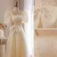 Élégant Champagne En Dentelle Fleur Robe De Bal 2022 Princesse Perle Encolure Carrée Gonflée Manches Courtes Dos Nu Noeud Longue Robe De Ceremonie