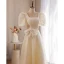 Élégant Champagne En Dentelle Fleur Robe De Bal 2022 Princesse Perle Encolure Carrée Gonflée Manches Courtes Dos Nu Noeud Longue Robe De Ceremonie